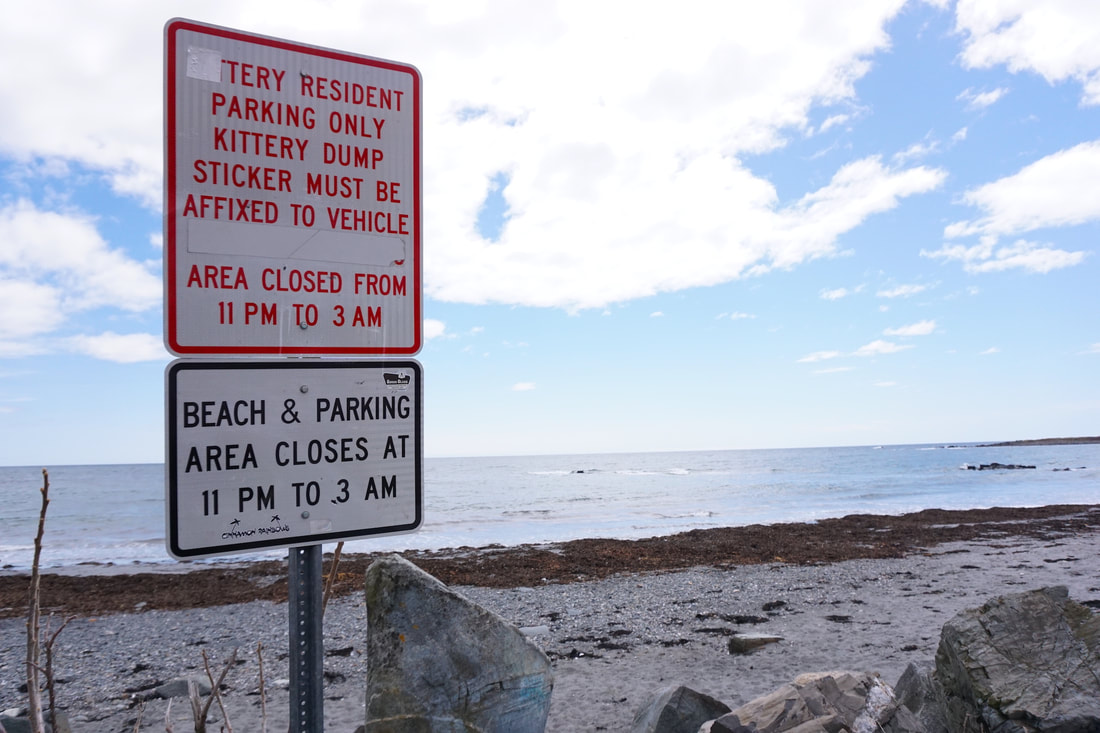 Sign warning of beach parking rules