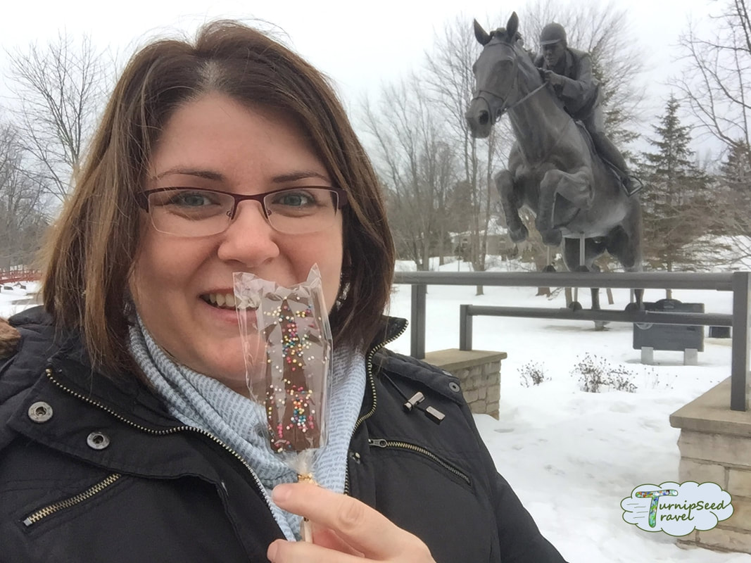 Posing with chocolate at Perth's Stewart Park in front of a statue of Ian Miller and Big Ben the horse