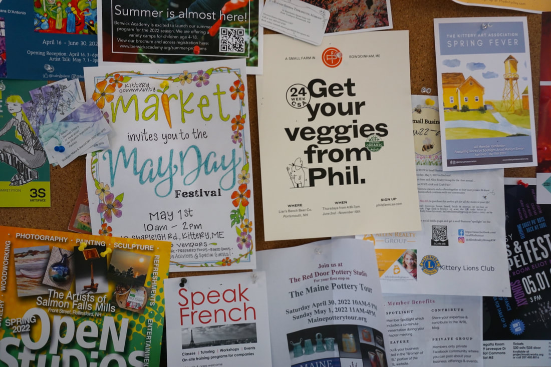 Busy bulletin board advertising language classes, art events, pottery tours, and market festivals