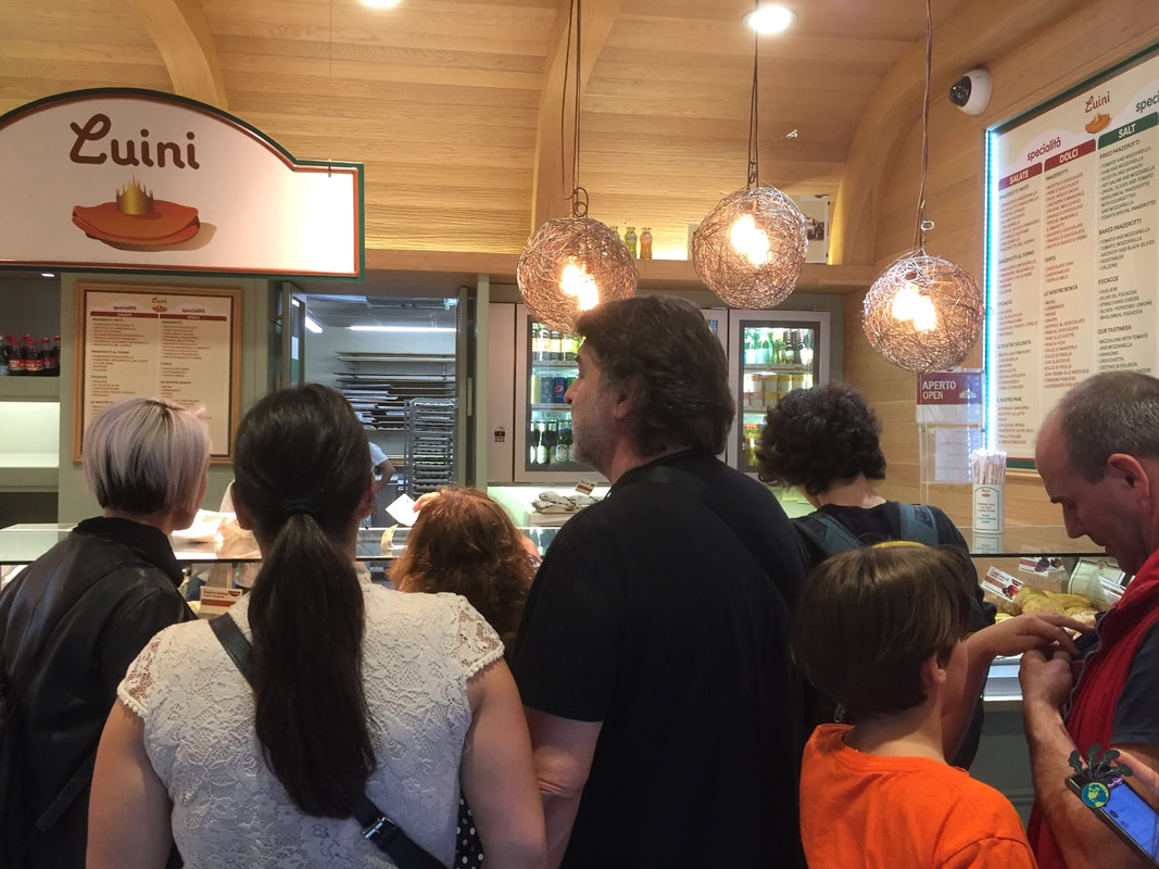 People lined up to buy panzerotti in Milan Picture