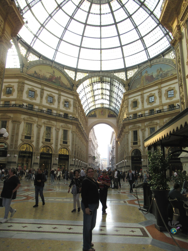 Galleria Vitorrio Emanuele walking under a domed glass ceiling