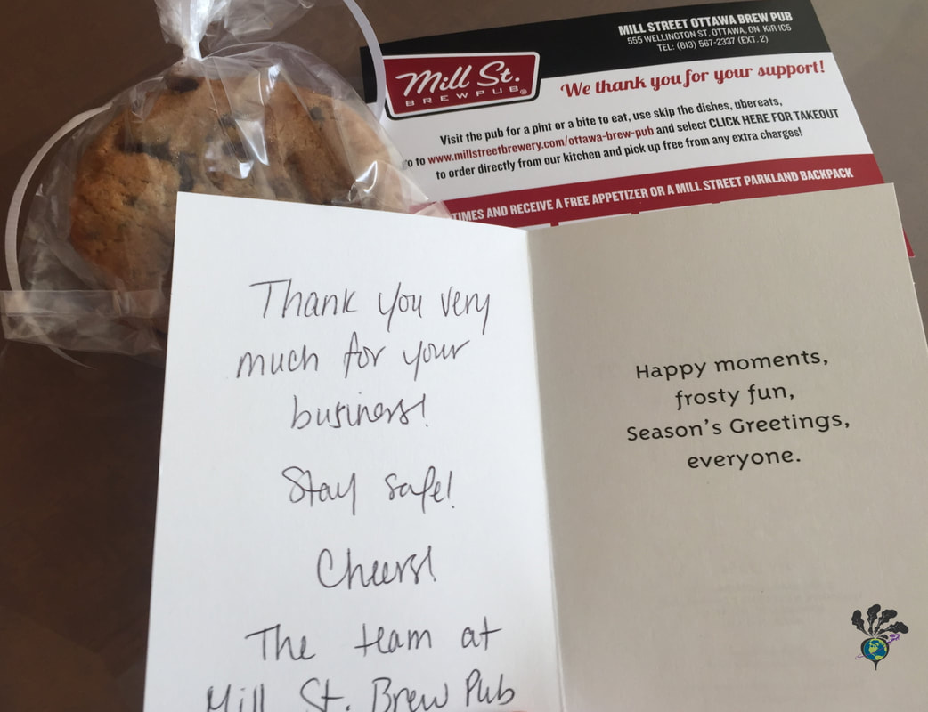 Thank you note and a cookie wrapped in cellophane