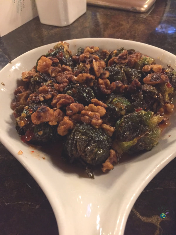 Platter of roasted Brussels Sprouts Glacier Distilling and the Glacier Park Lodge's Great Northern Dining RoomPicture