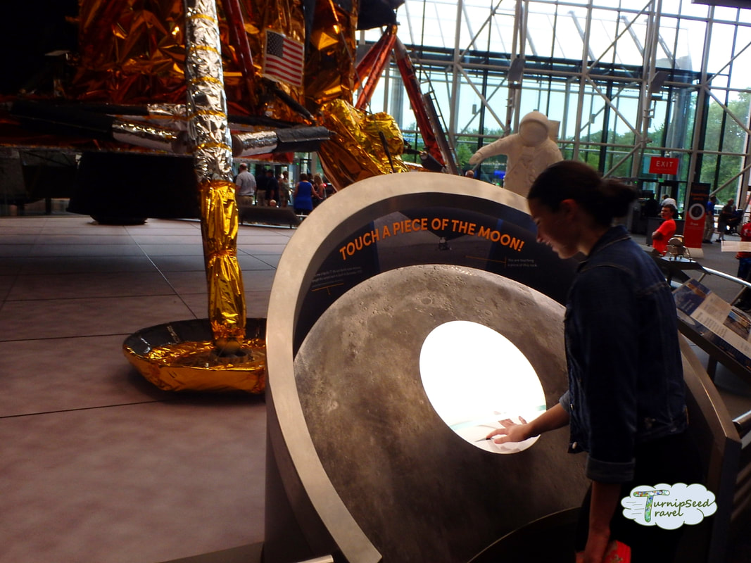 Interactive display on touching a piece of moon rock at the Smithsonian Air and Space Museum Picture