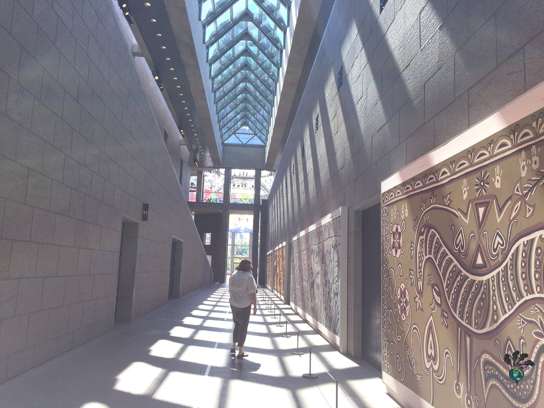 Vanessa walks down the sunlight grey corridors of the National Gallery of Canada