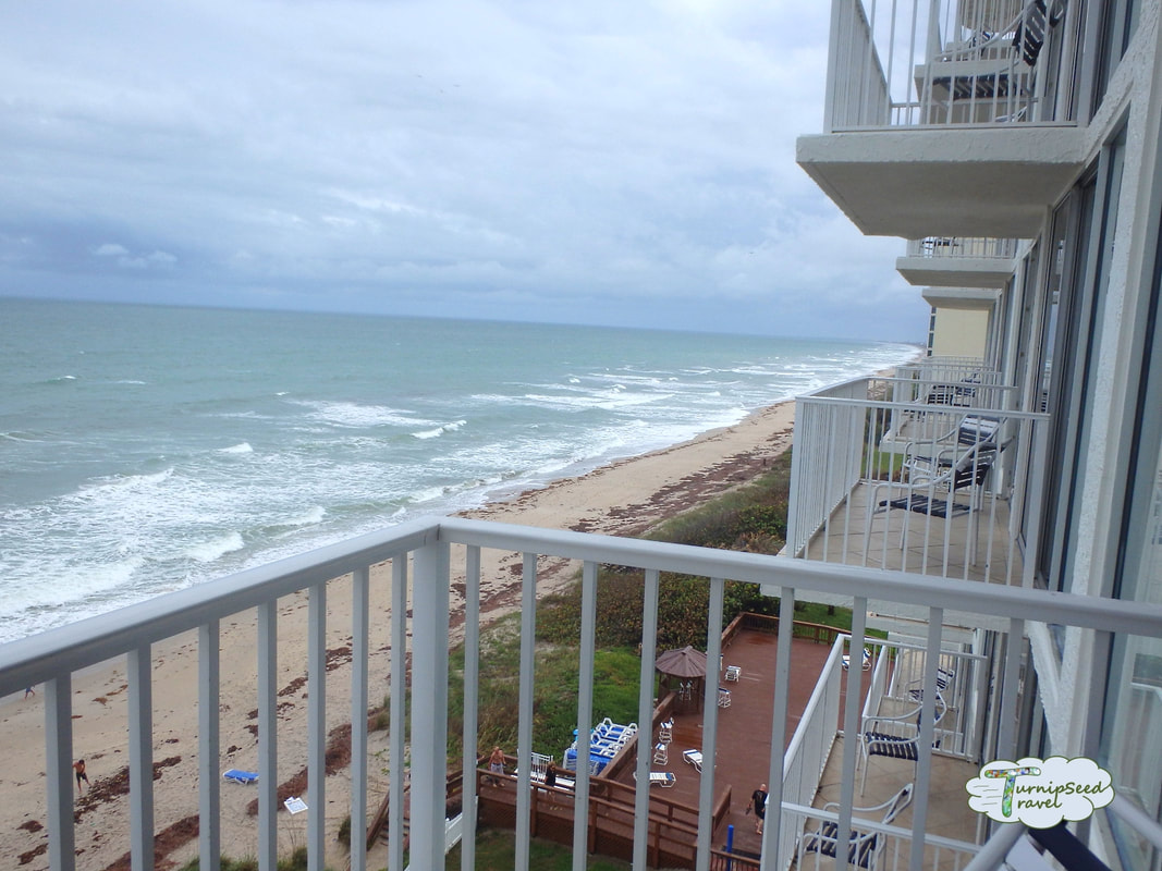Ocean views from the balconies of a large hotel