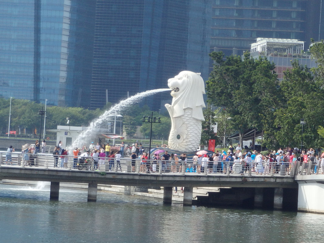 White Merlion statue near the river in Singapore