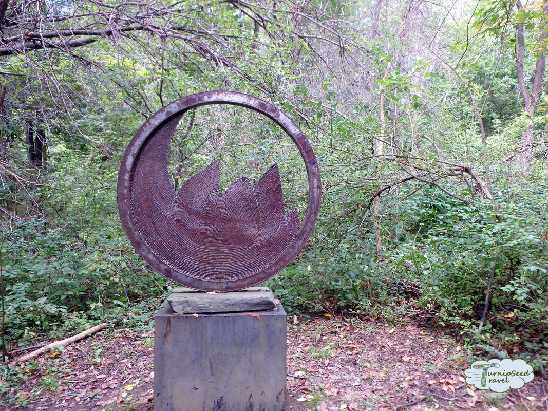 Griffis Sculpture Park Ellicottville NY Abstract metal sculpture in the woods