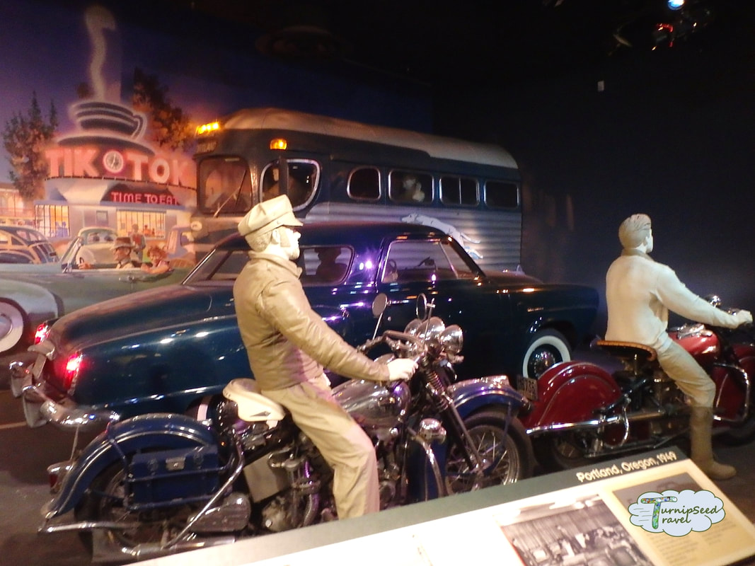 Motorcycles and mannequins are part of a display at the Smithsonian Picture